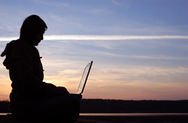 Top Secrets of Travel Writers laptop silhouette travel